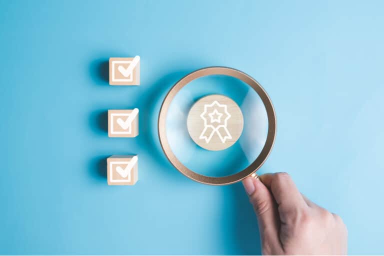 iso smart globe with check mark guarantee icons on wooden cube and copy space, certification and standardization, international organization for standardization iso and quality control certification